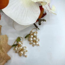 Cluster of pearl earrings